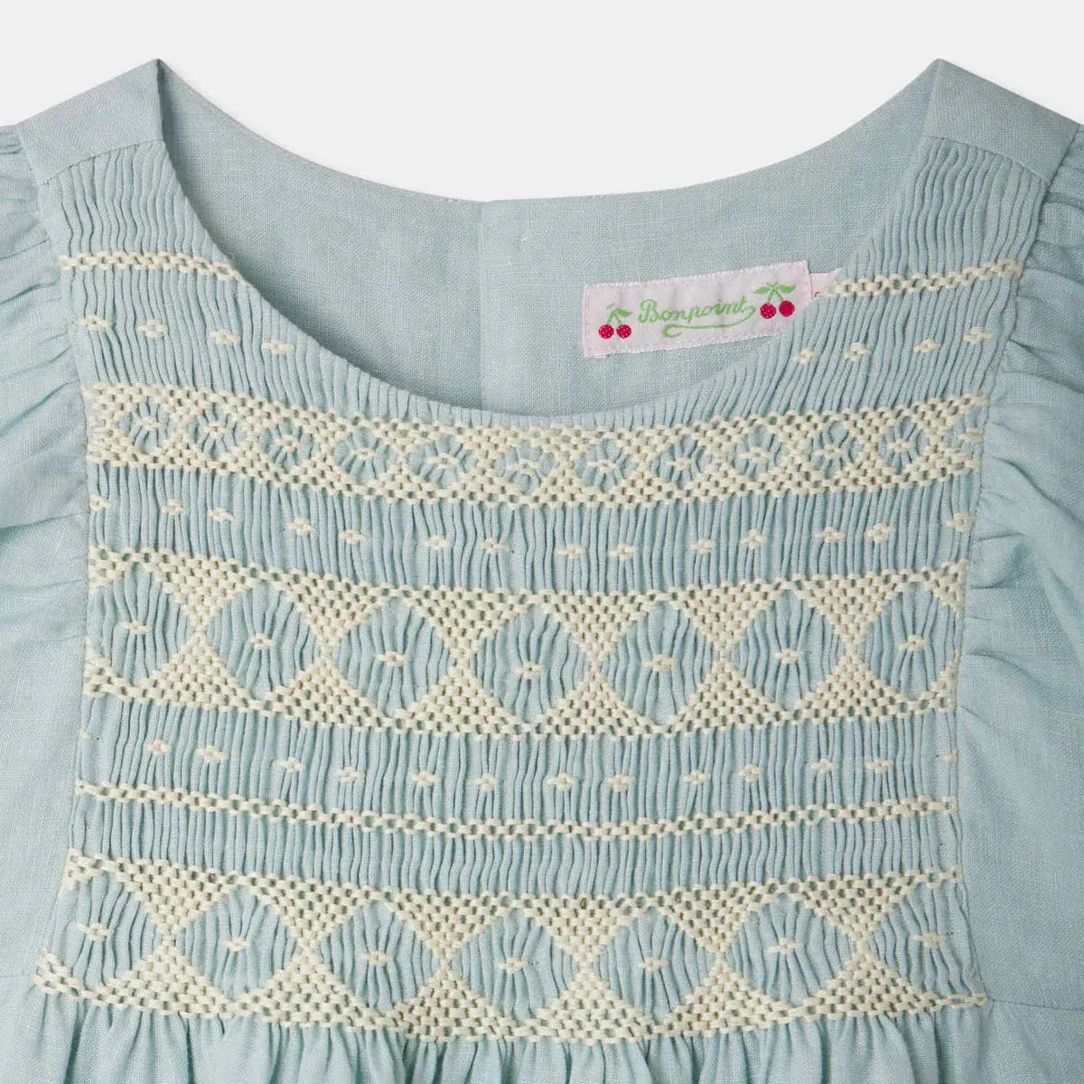 Emeraude smocked and embroidered linen dress