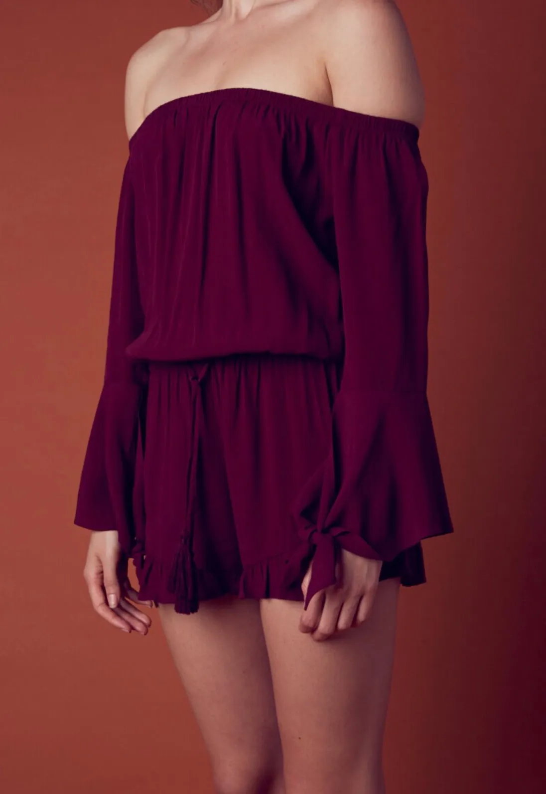 Off The Shoulder Bell Sleeve Tassel Ruffle Hem Romper