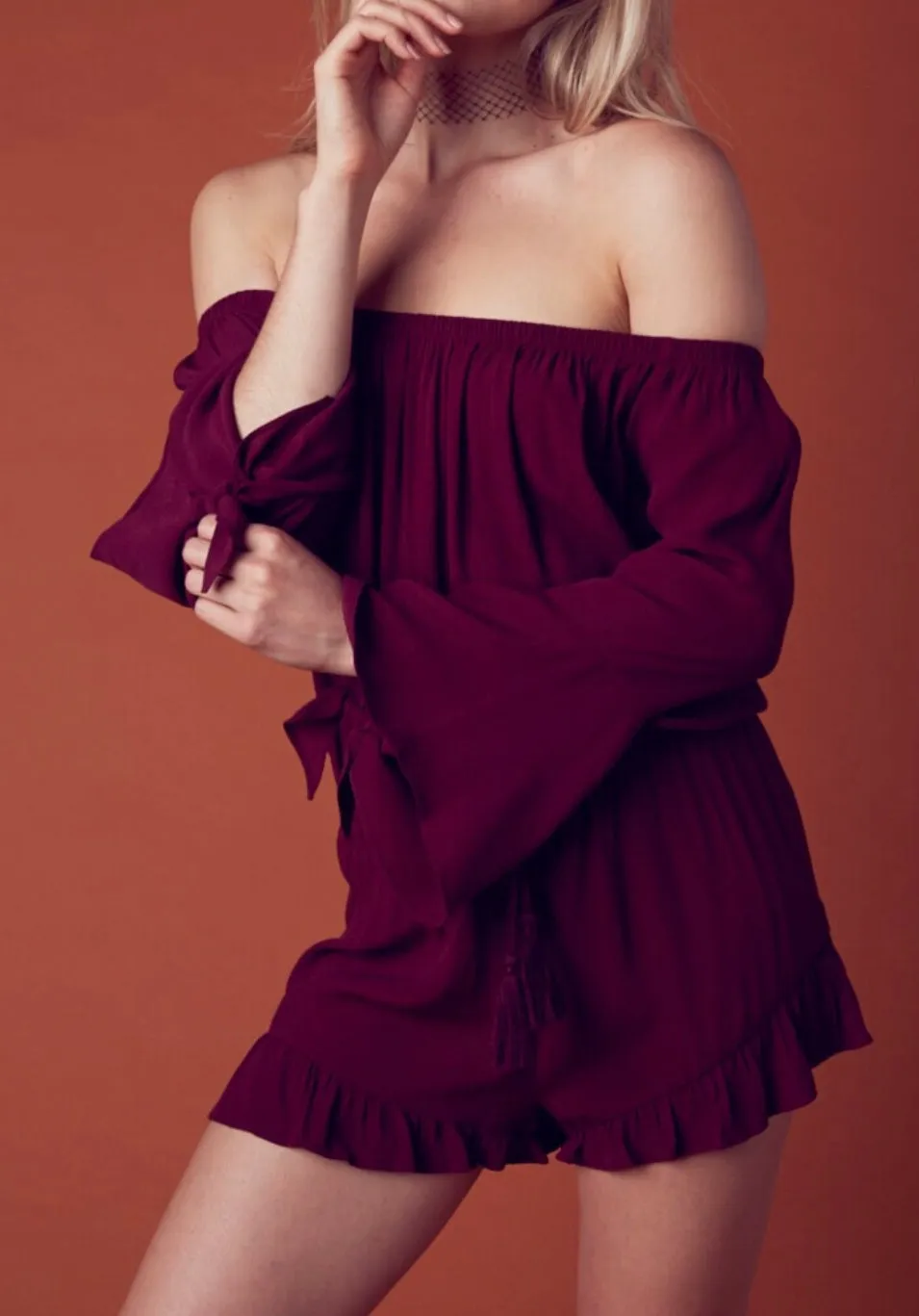 Off The Shoulder Bell Sleeve Tassel Ruffle Hem Romper