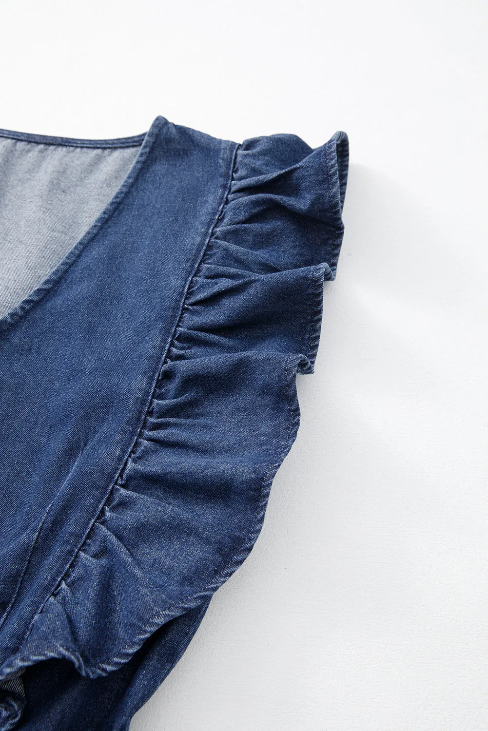 Rory,  Denim Ruffled Zipped Front Belted Romper